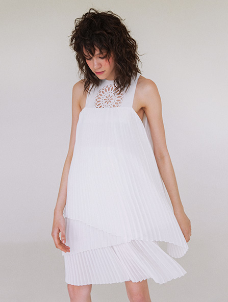 Pleated mini dress in white